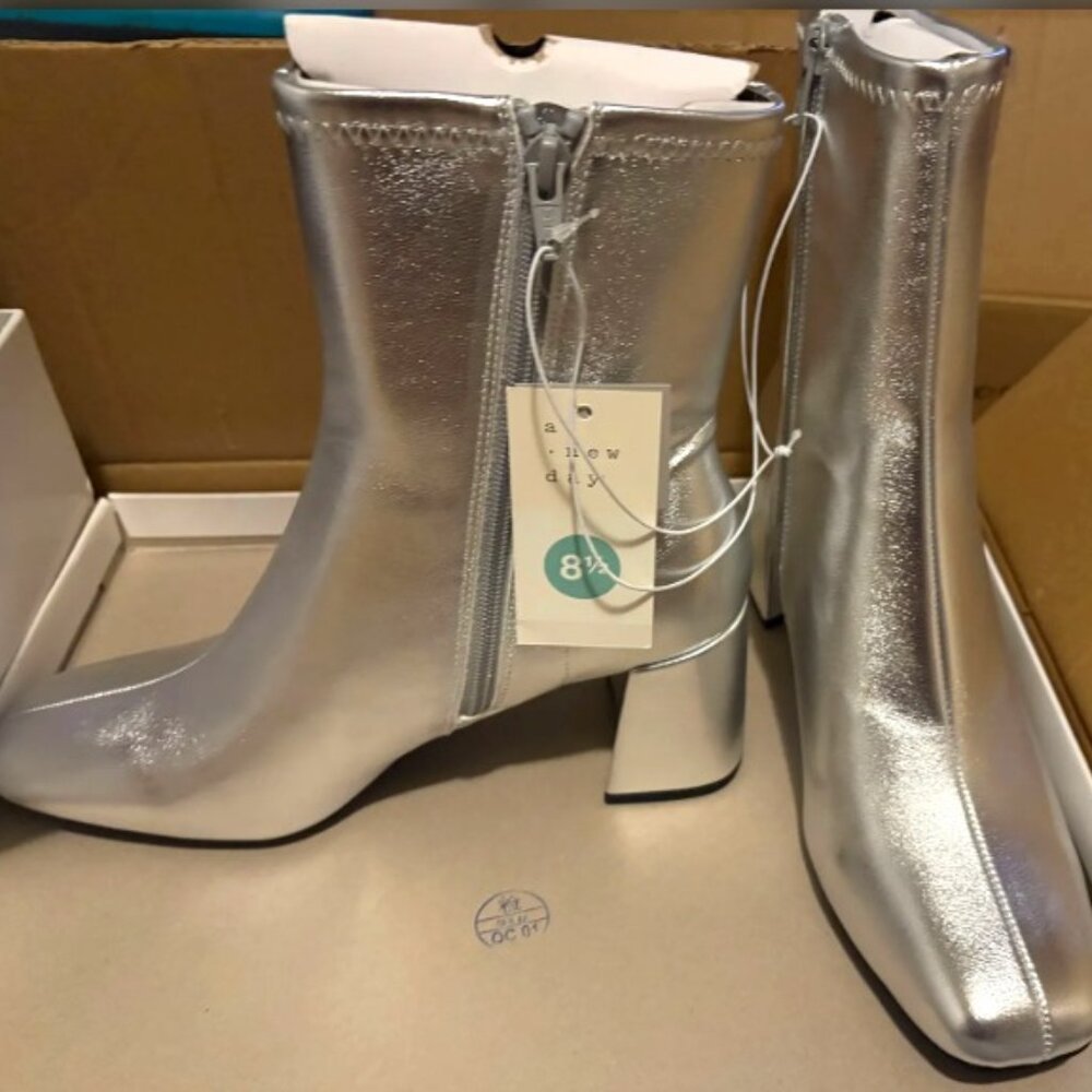 A New Day - Silver Heeled Boots